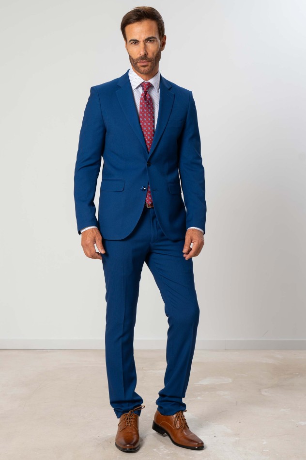 Traje elástico micropuntillé azul...