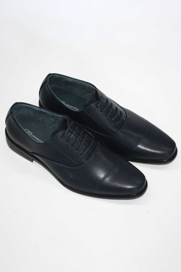 Zapato de vestir con costura en puntera