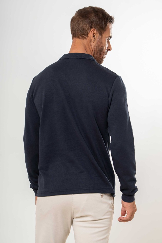 Polo liso con bolsillo