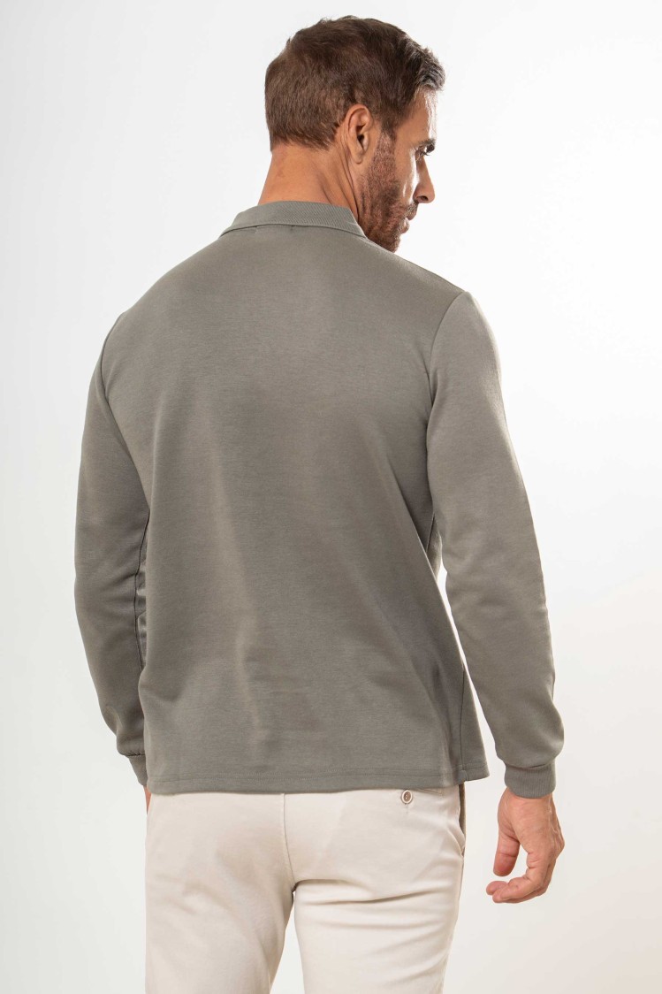 Polo liso con bolsillo