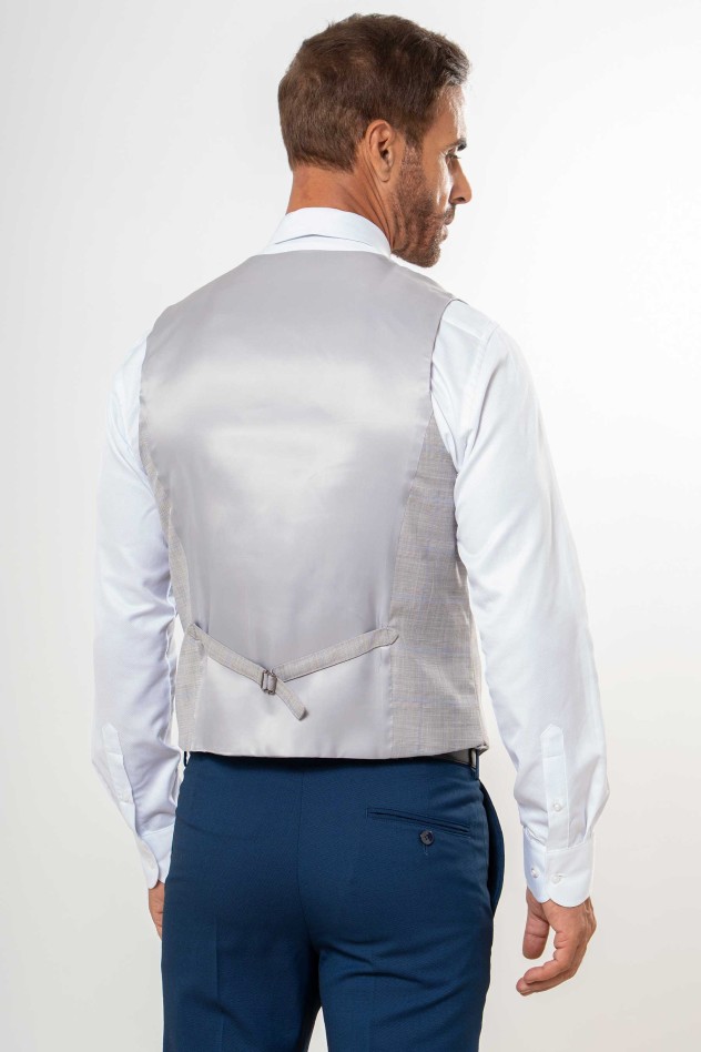 Chaleco cruzado cuadro discreto gris