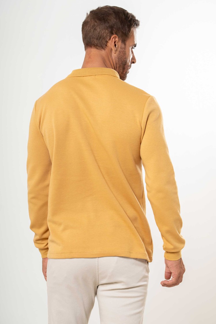 Polo liso con bolsillo